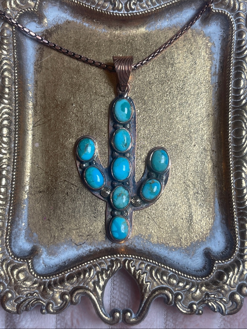 Genuine Turquoise cactus set in copper with copper chain
